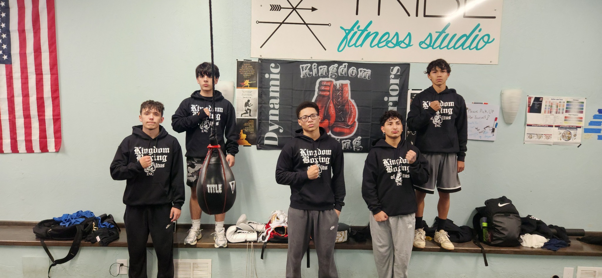 Younger Kingdom Boxing athletes lined up in hoodies